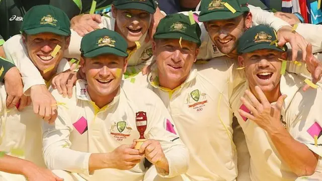 Australia with the Ashes urn