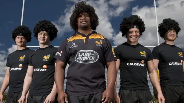 Ashley Johnson and Wasps players in wigs