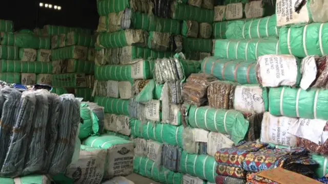 Bales of material in a warehouse in Kano, Nigeria