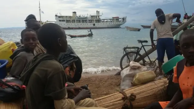 People on the shore of Lake Tanganyika in Tanzania