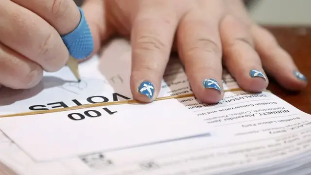 Lady with voting paper