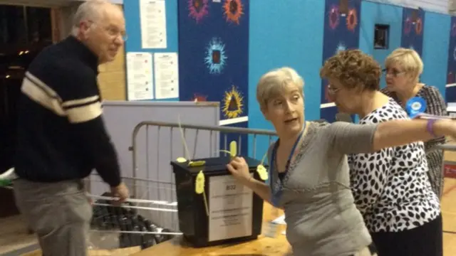 Ballot boxes arriving in a shopping trolley in Bury St Edmunds