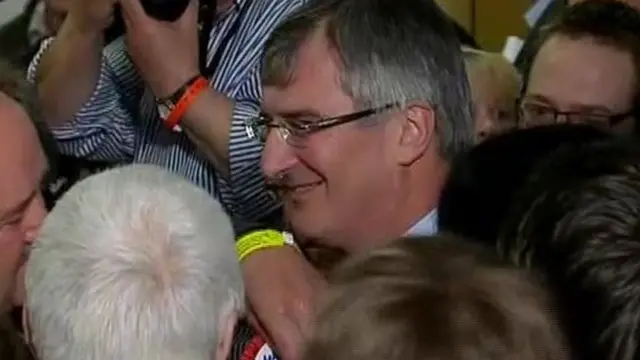 Tom Elliott was cheered by supporters as the result was declared