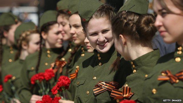 Schoolgirls wear historical uniforms