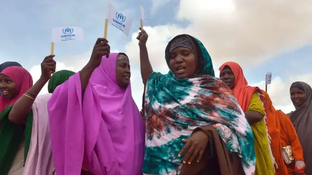 Somali women dance to welcome United Nations High Commissioner for Refugees Antonio Guterres at IFO-2 complex of the sprawling Dadaab refugee camp on May 8, 2015