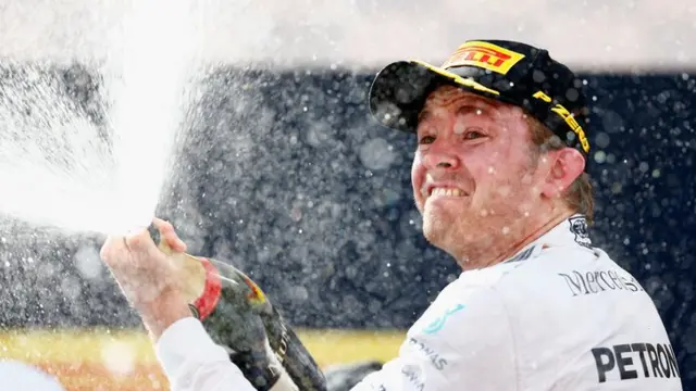 Nico Rosberg lets the Champagne flow