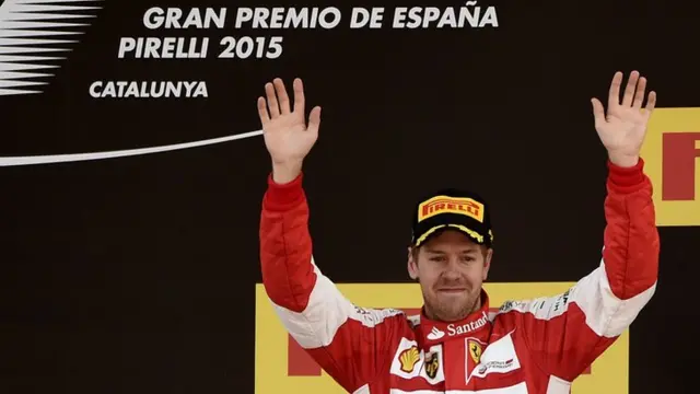 Sebastian Vettel waves after his third place finish