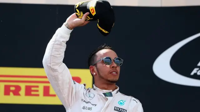 Lewis Hamilton celebrates his second place finish