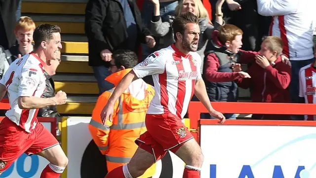 Simon Walton of Stevenage celebrates after scoring