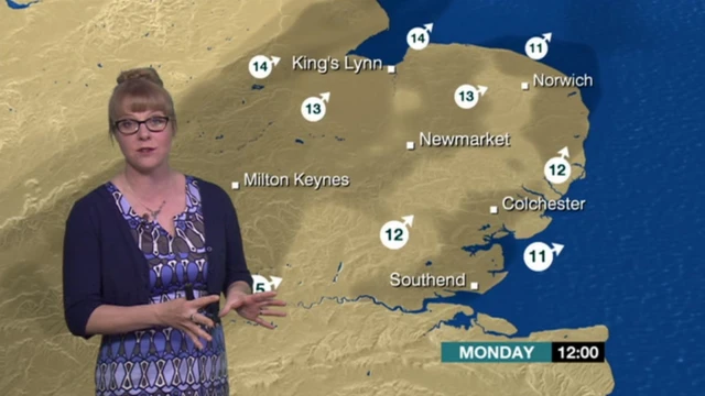 Kate Kinsella with a weather map