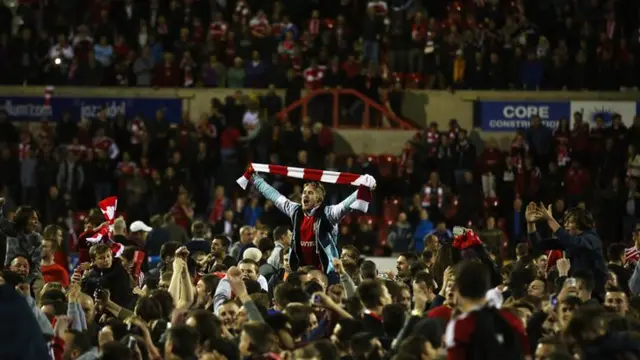 Swindon fans celebrate reaching Wembley