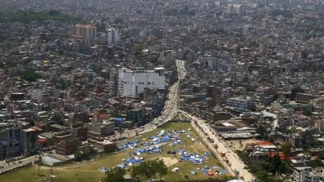 Temporary shelter in open ground seen from above before the earthquake