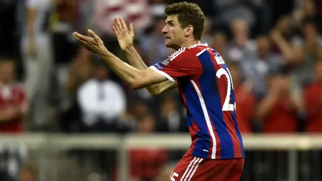 Thomas Muller encourages his team