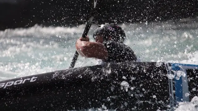 A kayak doing an Eskimo roll