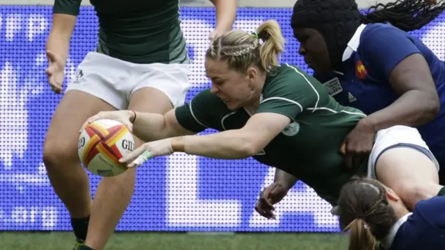 Ireland's Niamh Briggs scores a try