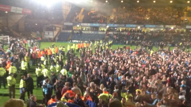 Wycombe celebrate a famous win at Adams Park