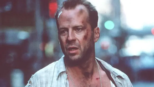 Bruce Willis as John McClane