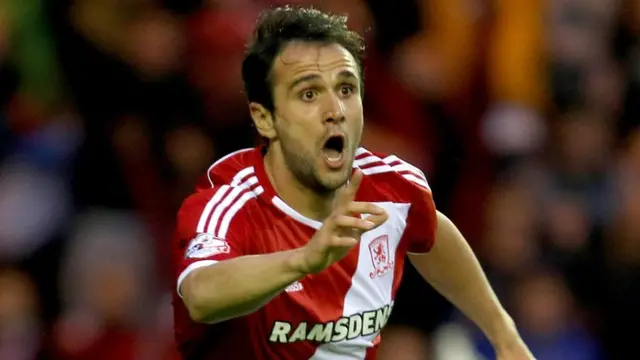 Kike celebrates his goal