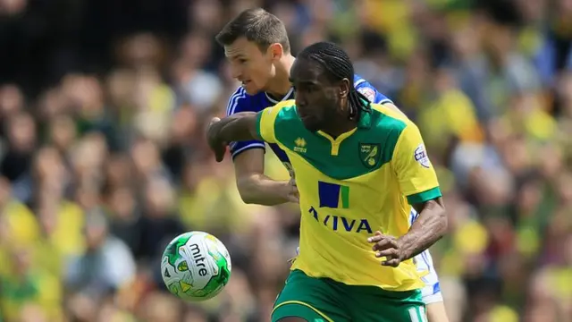 Cameron Jerome and Tommy Smith tussle