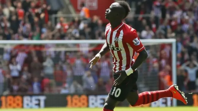 Sadio Mane celebrates scoring his third goal