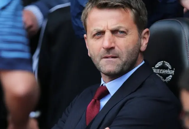 Tim Sherwood looks on