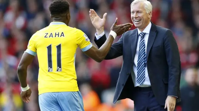 Zaha celebrates with Pardew