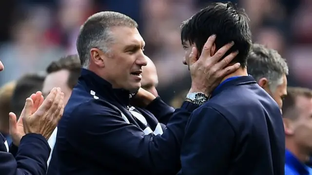 Nigel Pearson and players celebrate staying up