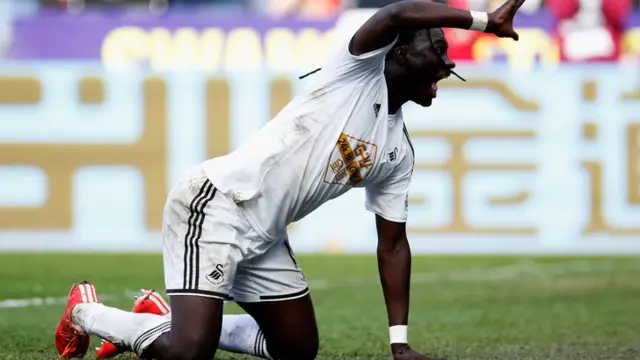 Gomis celebrates his goal