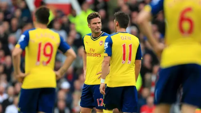 Olivier Giroud stands dejected