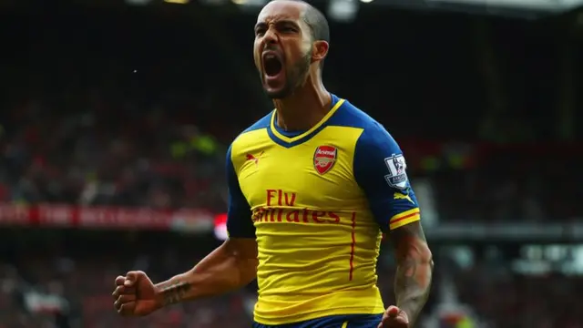 Walcott celebrates his goal