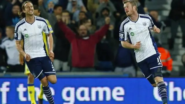 Chris Brunt celebrates