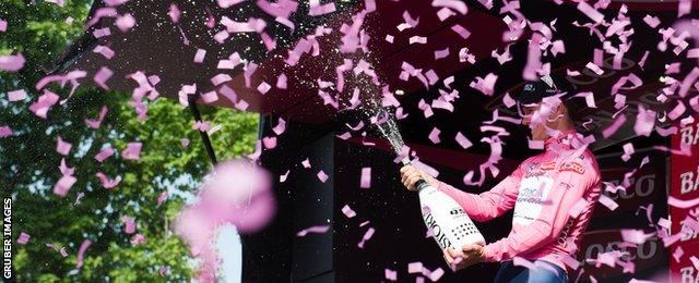 Australia's Simon Clarke celebrates taking the overall lead of the Giro after stage four