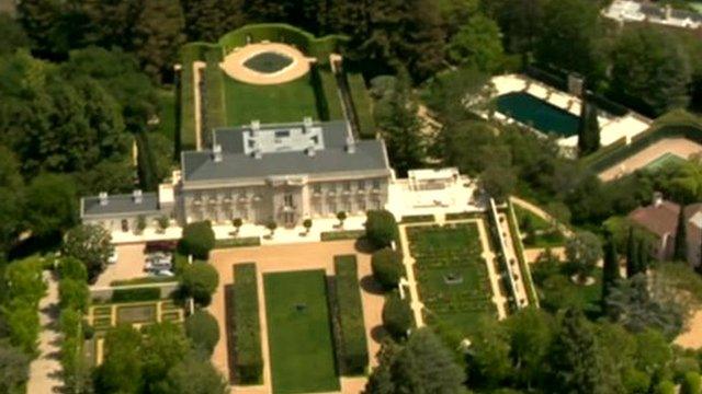 House with lawns and a pool