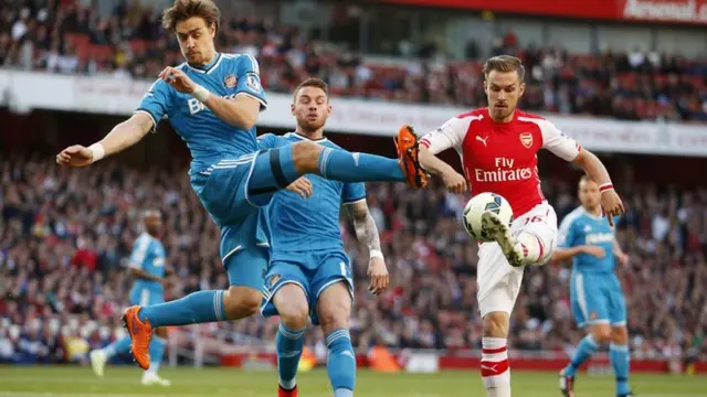 Coates has to defend from Aaron Ramsey