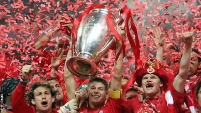 Liverpool captain Steven Gerrard (centre) celebrates winning the Champions League with his team-mates