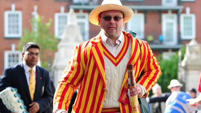 An MCC member making his way into the ground