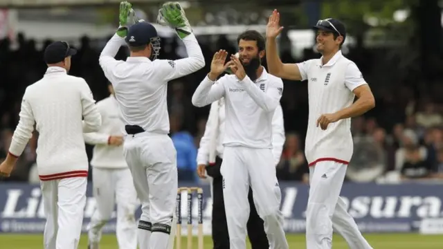 Moeen Ali celebrates with his teammates