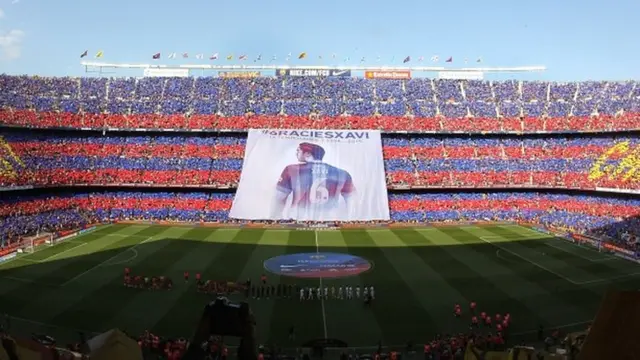 Xavi is celebrated at the Nou Camp