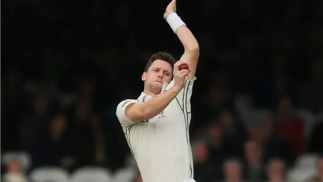 Matt Henry bowling