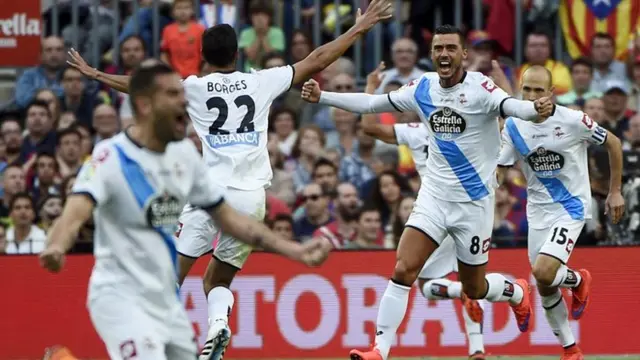 Deportivo players celebrate