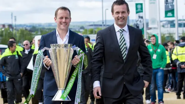 Former Celtic striker Harald Brattbakk with the league trophy and manager Ronny Deila