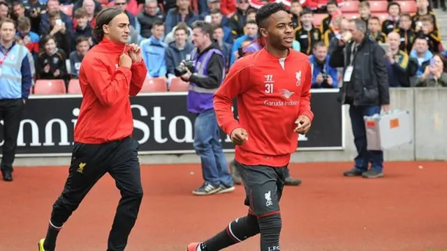 Liverpool forward Raheem Sterling (right)