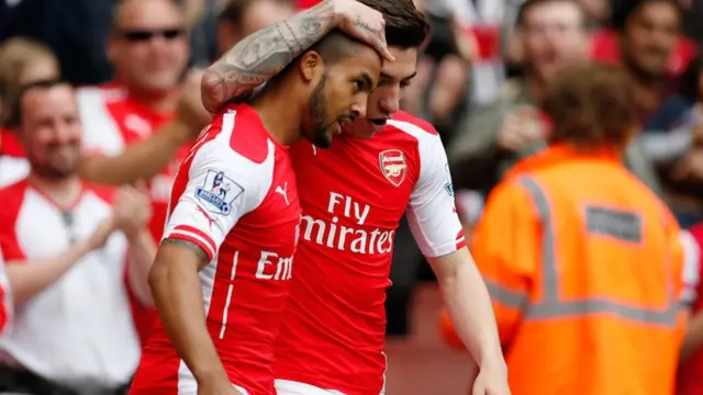 Walcott celebrates