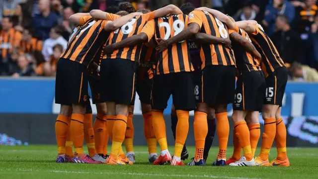 Hull City players form a huddle