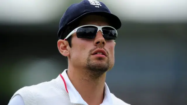 Alistair Cook looks on