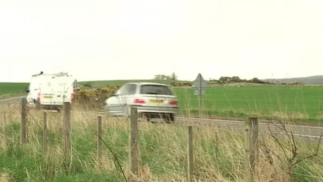 Cars driving on roads