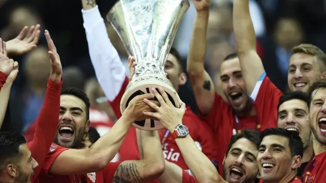 Sevilla lift the Europa League trophy