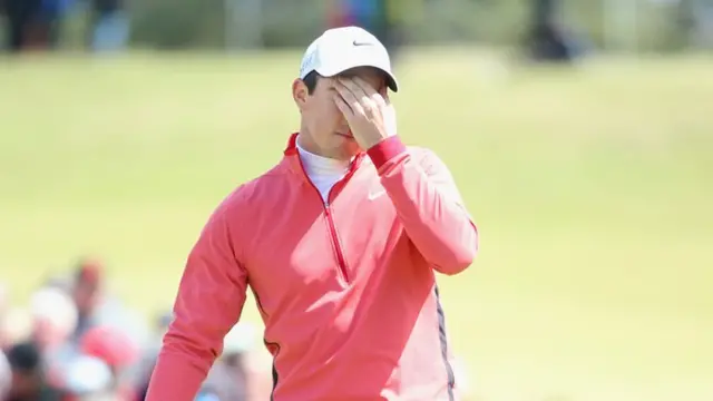 Rory McIlroy reacts to a missed putt