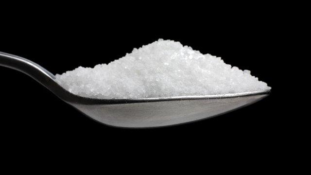 A spoonful of granulated sugar