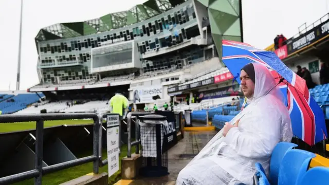 A fan in the rain at Headingley